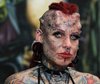 tattooed-and-pierced-woman-with-subdermal-implants-423x356.jpg