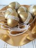 golden-easter-eggs-with-pearls-crafts-easter-decorations-seasonal-holiday-decor.jpg